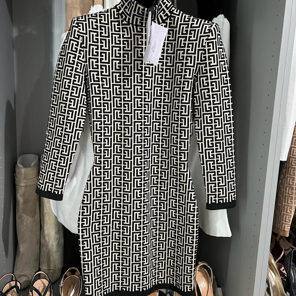 BALMAIN
Monogram-jacquard knit mini dress
